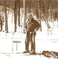 Jay Peak's first mountain manager Don McNally fishing for Northern Vermont's legendary fur-bearing trout 